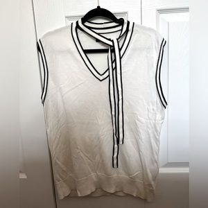 Lightly worn Tommy Hilfiger vest. White. Does not fit anymore.